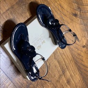 Navy sandals with a flower design